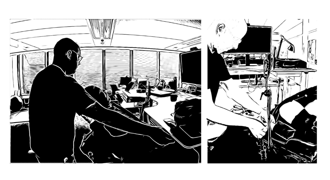 A comic-like still image in black and white of  video clip shows a wheelchair with muscular dystrophy at his work desk being supported by his personal assistant to access his workstation.